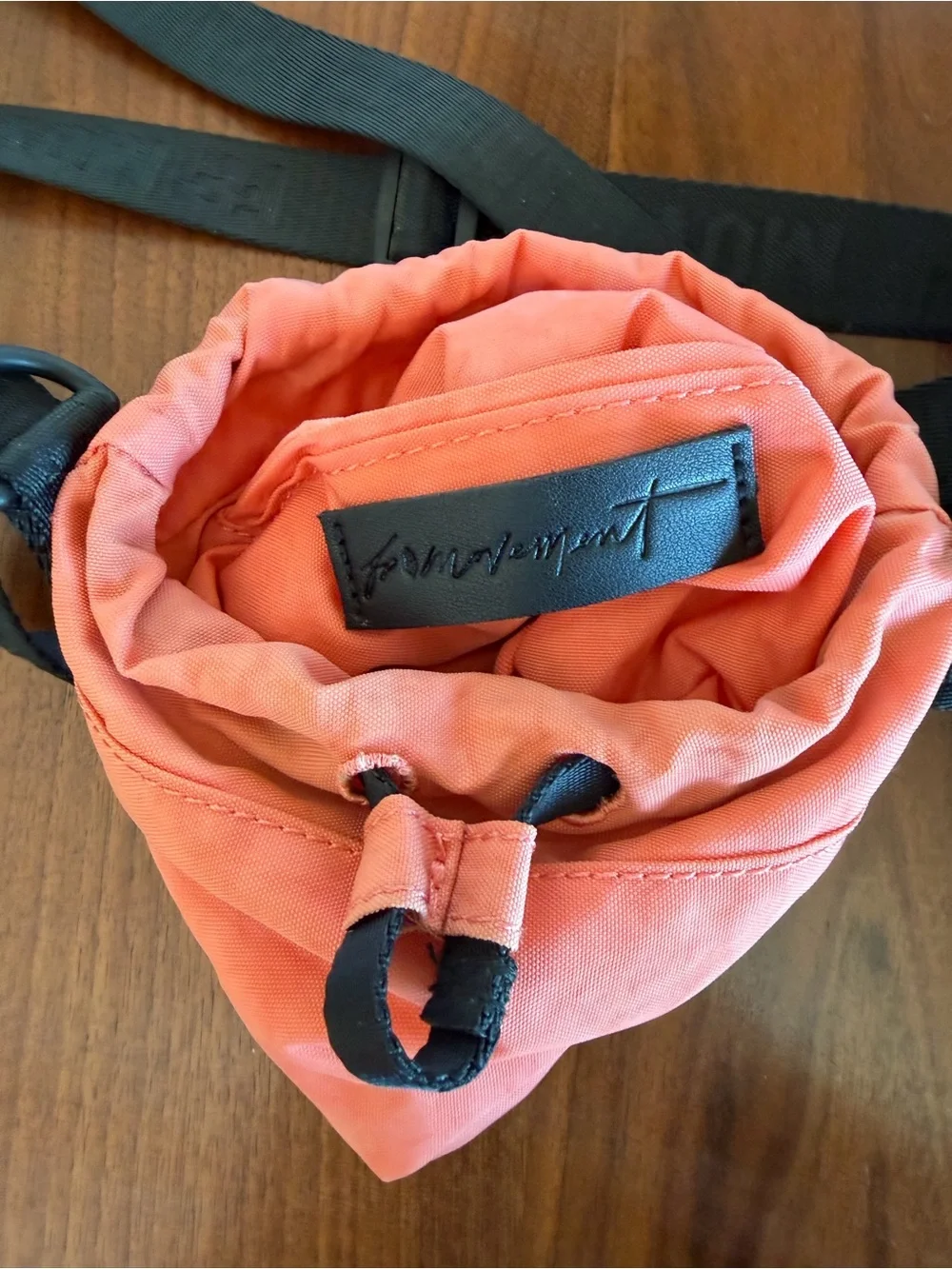 FP Movement by Free People Coral Drawstring Crossbody with Black Strap